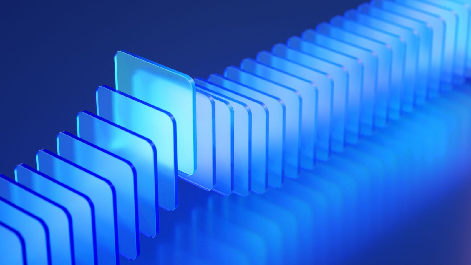 Blue translucent acrylic sheets in motion, suggesting layered AI systems, controls, and operational complexity
